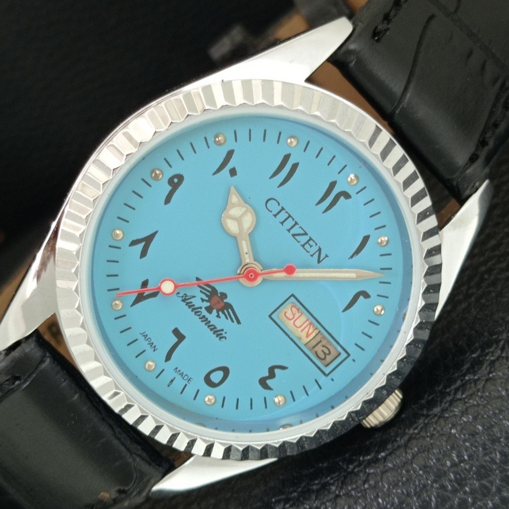 Vintage 1985 Citizen Automatic Mens Silver Watch WDaydate  Blue Accents